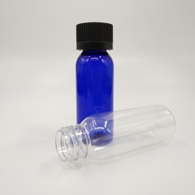 1 oz Cobalt Blue Plastic Boston Round Bottles With Black Ribbed Cap
