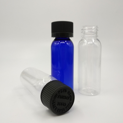 1 oz Cobalt Blue Plastic Boston Round Bottles With Black Ribbed Cap