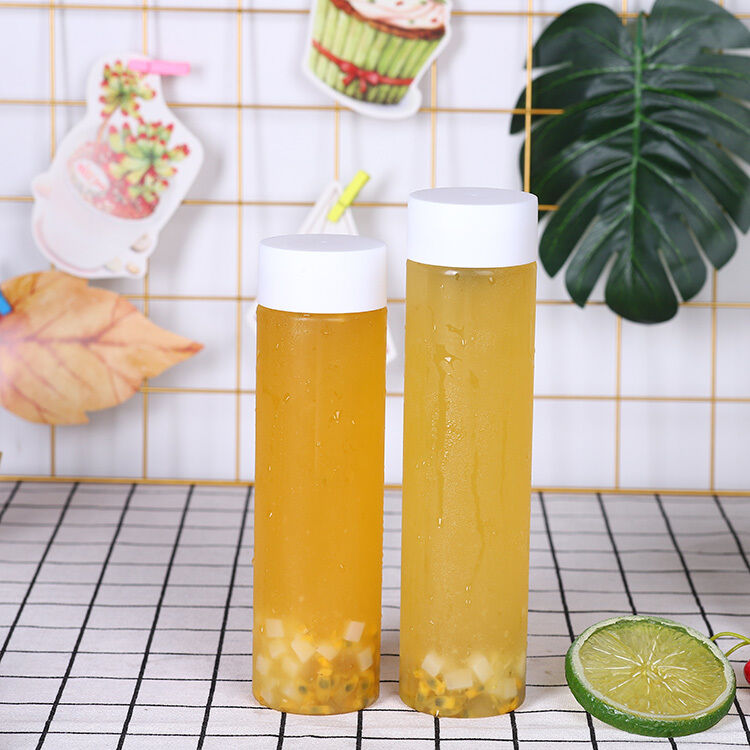 Handle Yes Milk Tea Bottles 05kg Screw on Lid Leak Proof Design Ideal for Commercial Beverage Packaging and Distribution